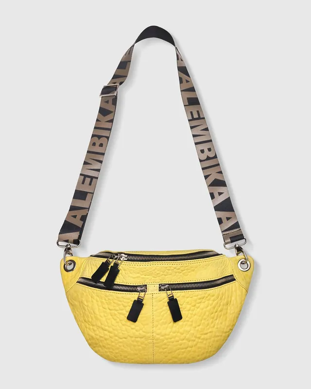 alembika-on-the-go-large-sling-bag-gelb image 1