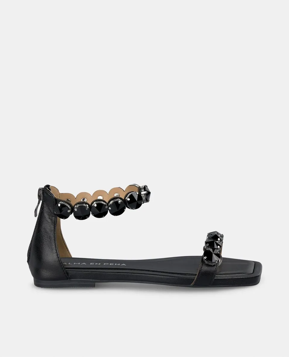alma-en-pena-flat-sandal-straps-detail-flache-sandale-schwarz image 1