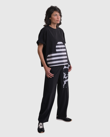 alembika-tekbika-floral-flow-pants-black-tech-hose-mit-taschen image 5